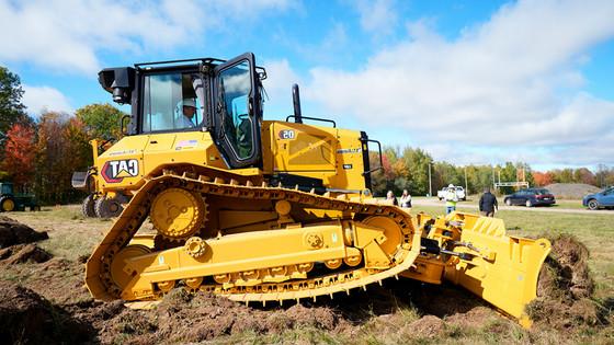 A bulldozer breaking ground